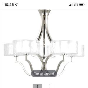 Brand new chandelier in box still, never used